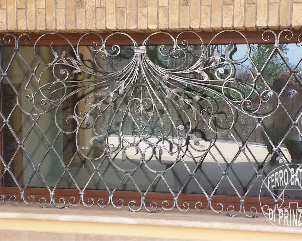 Grille fixe en fer forgé