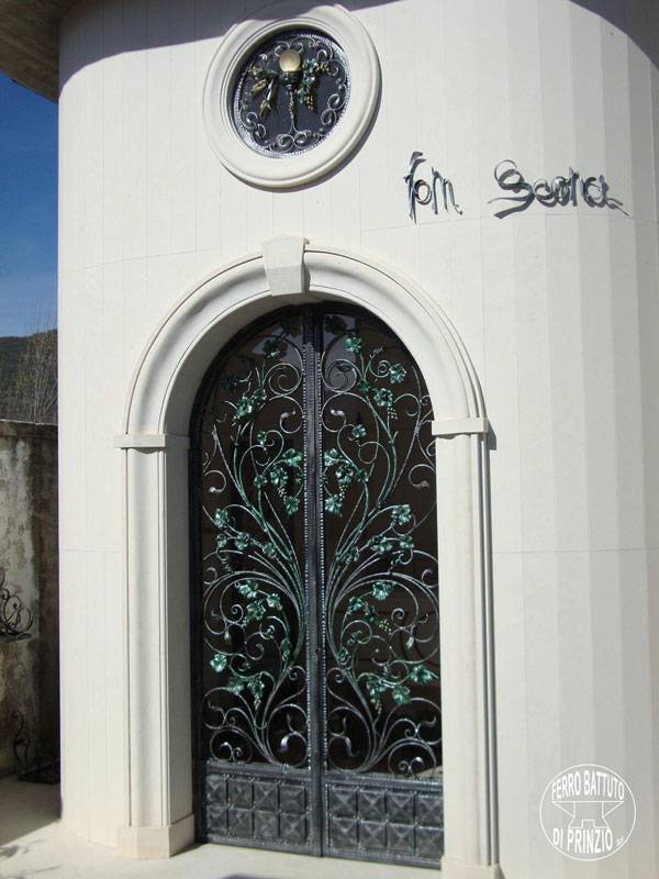  Porte en fer forgé avec vertes